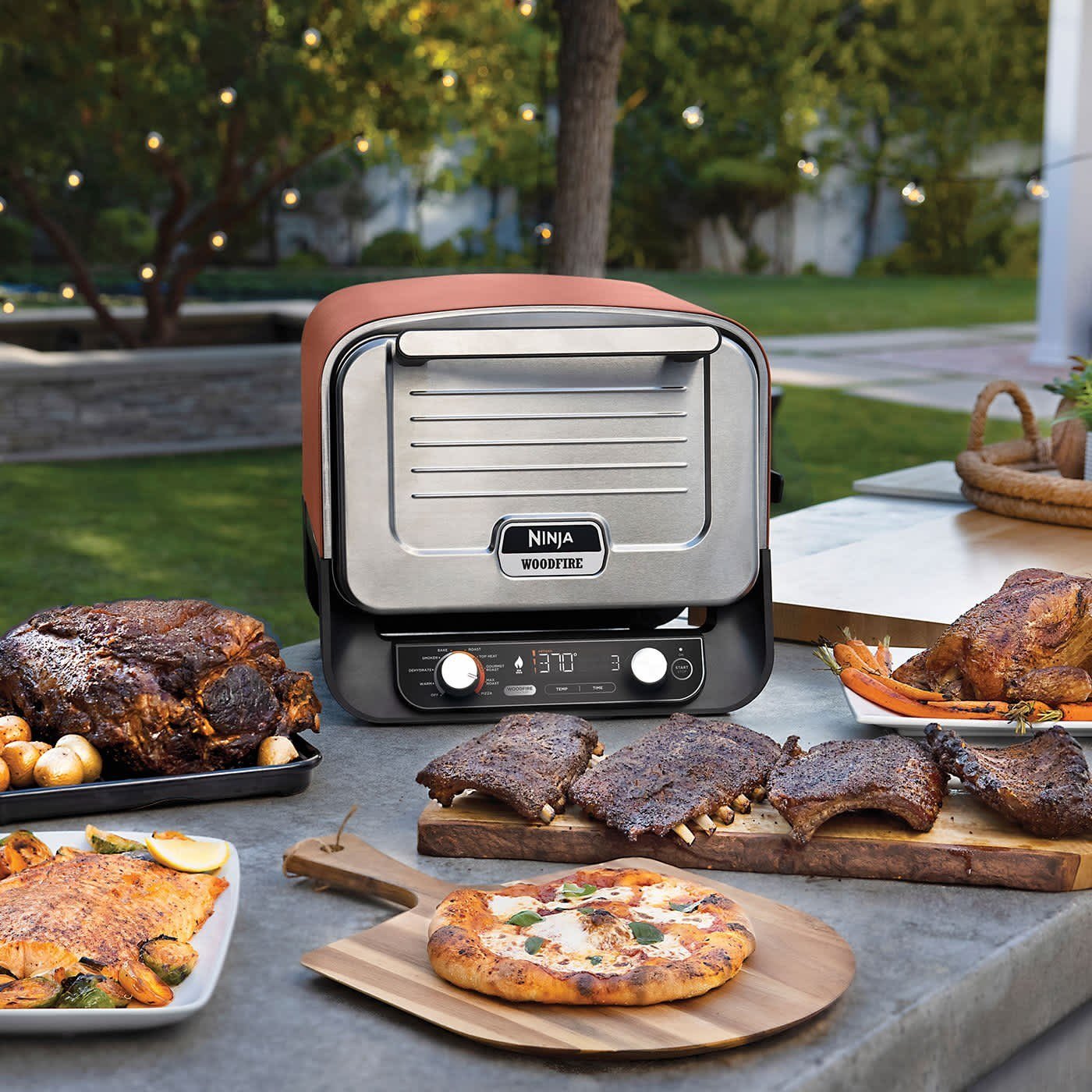 0-58.jpg Ninja™ Woodfire Outdoor Oven, Artisan Pizza Maker and BBQ Smoker with Stand & Cover - Image 1